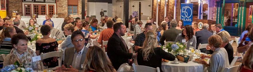 alumni and guests enjoy a luncheon at the alumni awards celebration in 2017