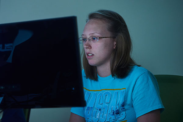 student looking at computer screen