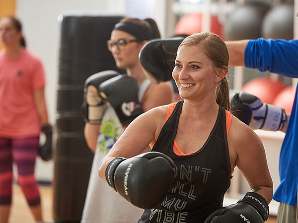 Students in a kickboxing class during the Women of the Rec event