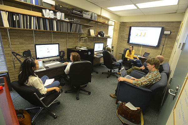 history masters students in a seminar discussion with faculty