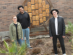 Artists in front of The Buddy System