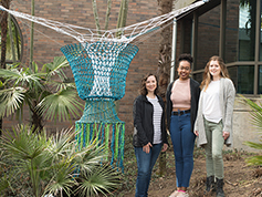 Artists in front of Community Connections