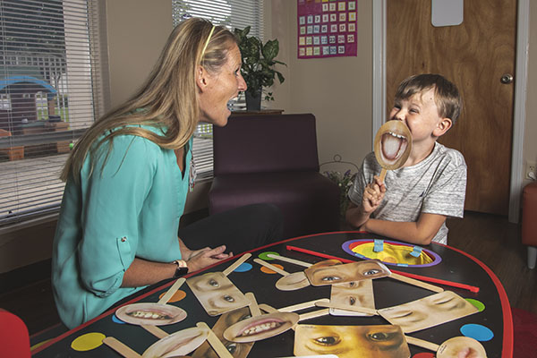 BCBA working with child