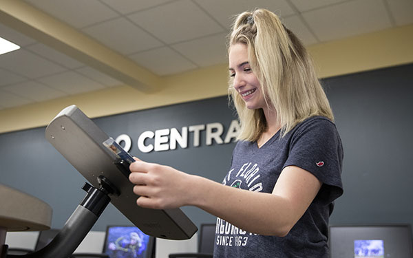 A student swipes their Nautilus Card to check in at Argo Central.