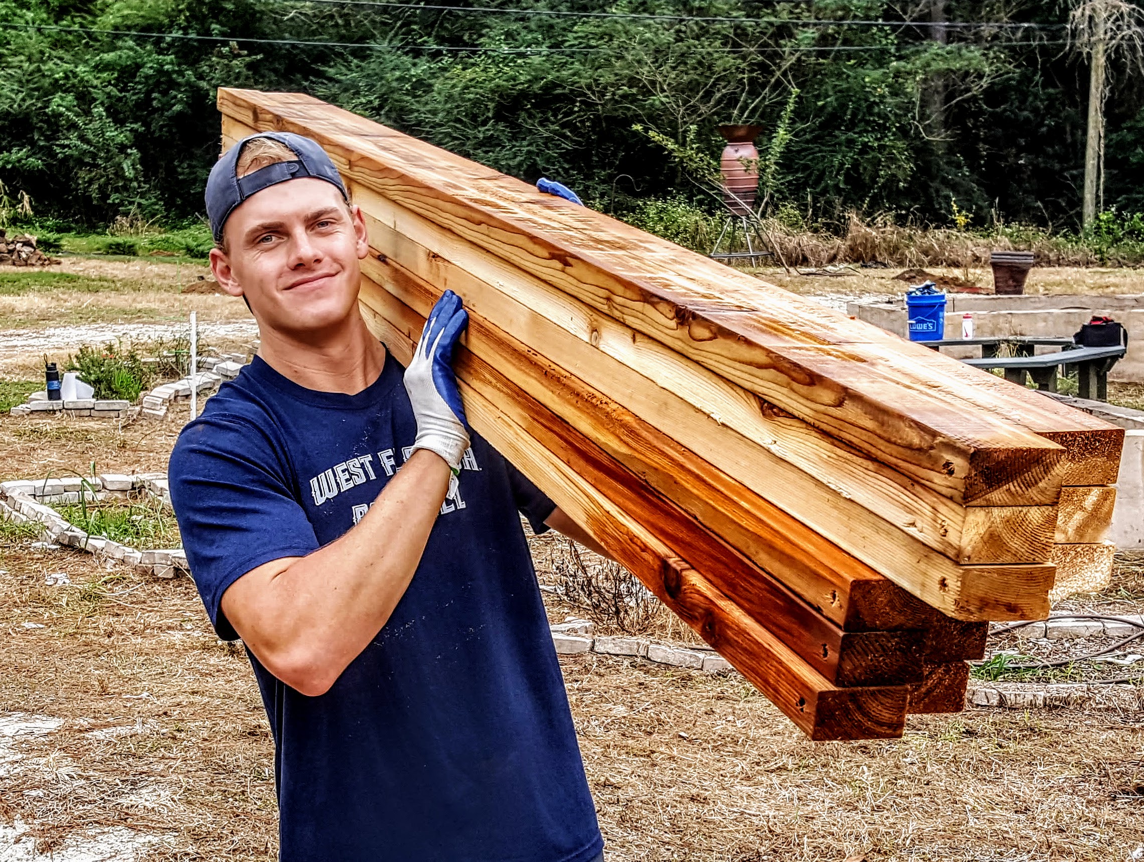 Student working in community garden