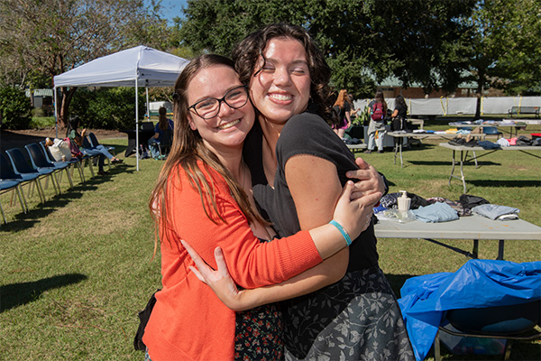 Honors students volunteering at Free-Wear Fair