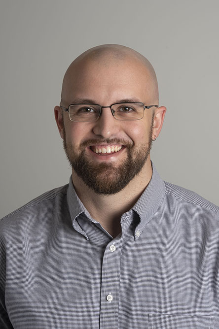 Adam Blood indoor headshot.