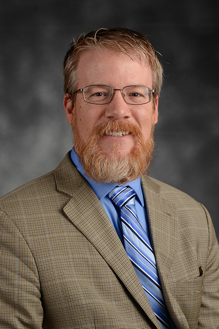 Matthew Schwartz indoor headshot.