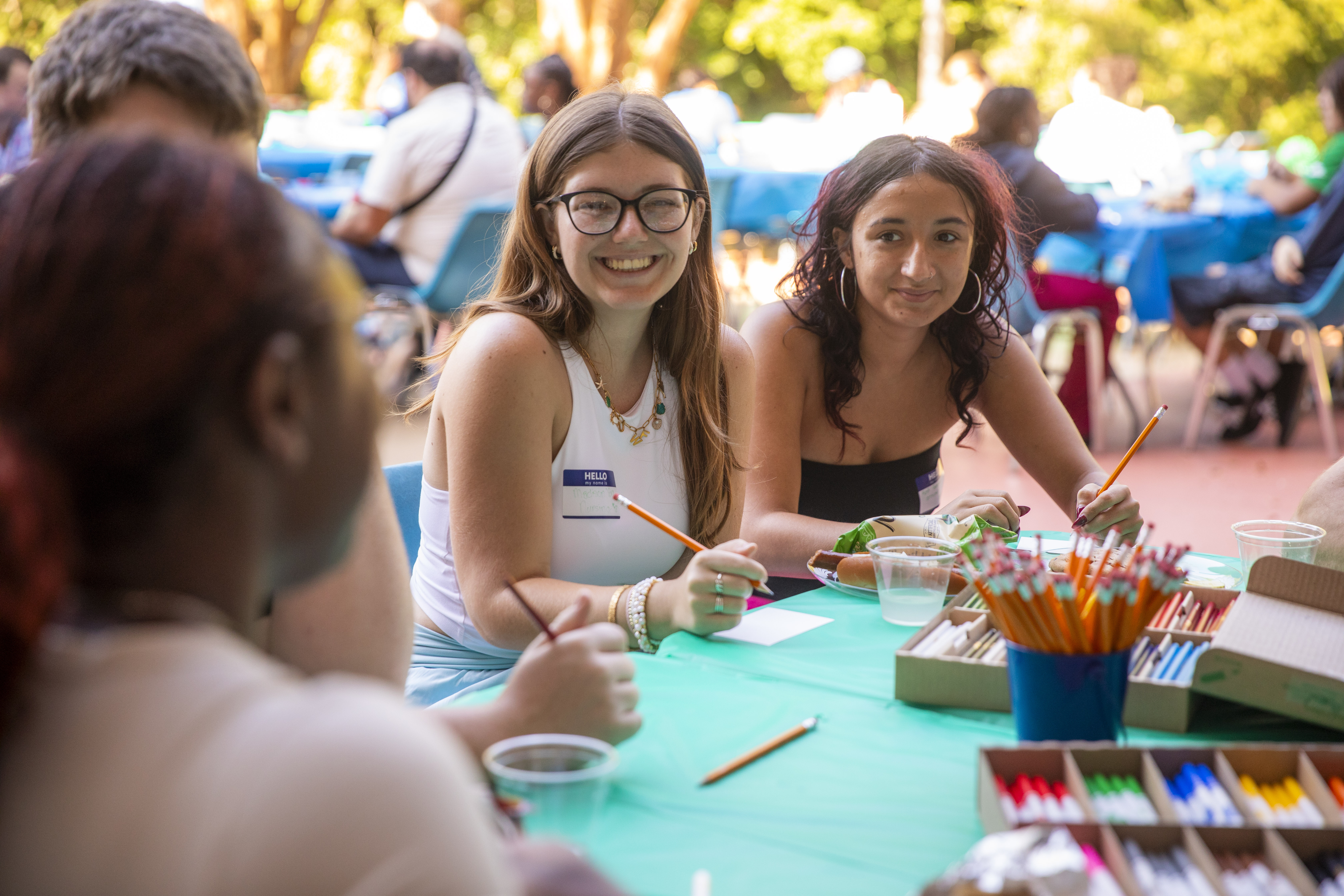 Students sitting around a table talking