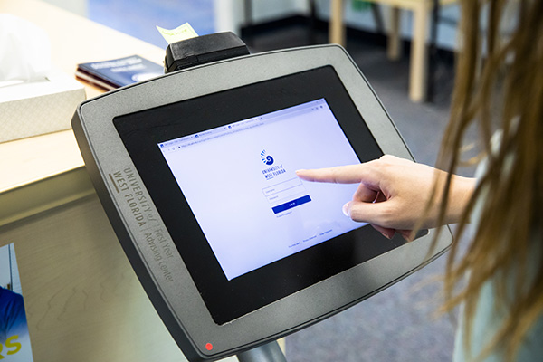 Student swiping into Navigate.