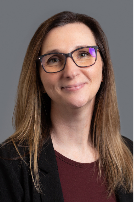 Professional headshot of Amber Hudson against a neutral backdrop