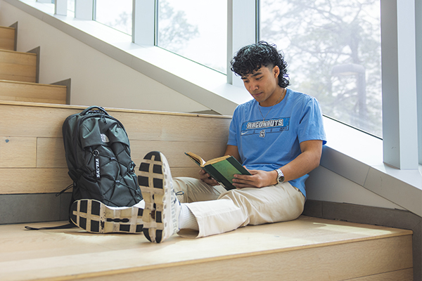 student reading a book