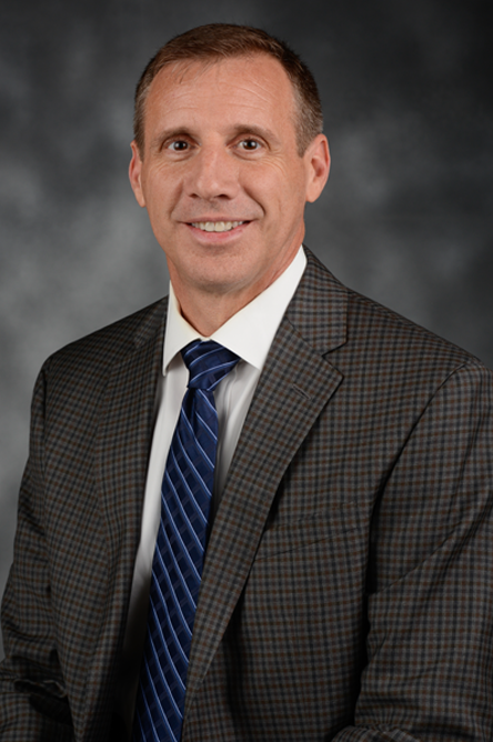 John Pecore headshot.