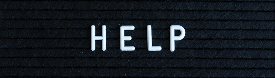 Felt letter board with the word 'HELP'