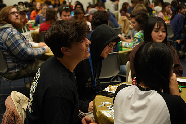 student sitting at a table