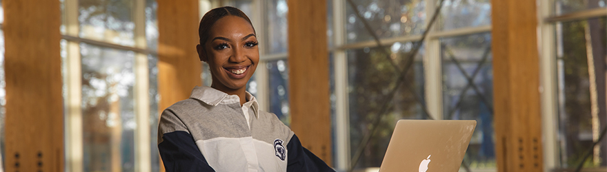 Student working on a laptop