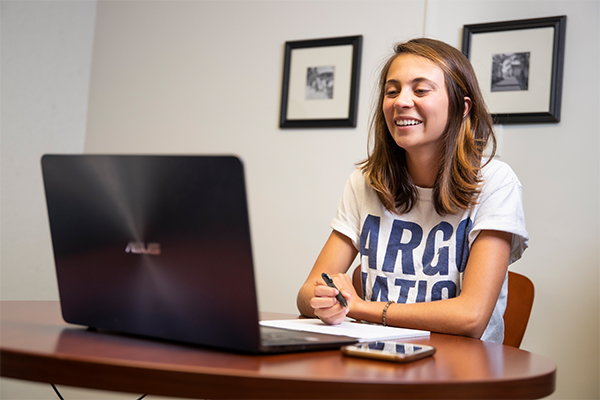 Student working on a laptop