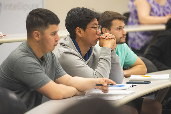 students listening to lecture on career development