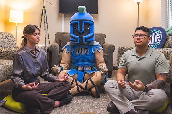 Students sitting with Argie Meditating