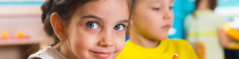 student sitting in classroom