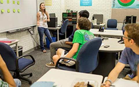 students in tutoring session