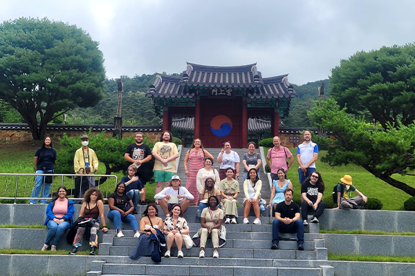 Faculty Posing in front of International Affairs trip
