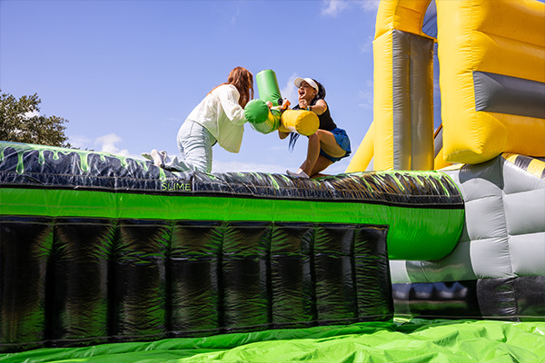 Two students battling for the Golden Fleece Challenge