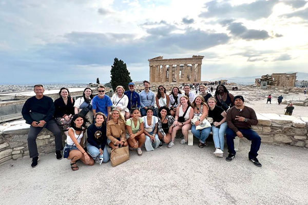 Students and faculty posing for a study abroad trip