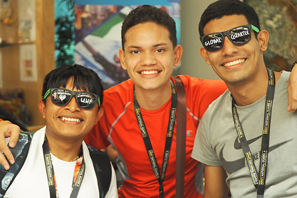 Students posing together in International Affairs building