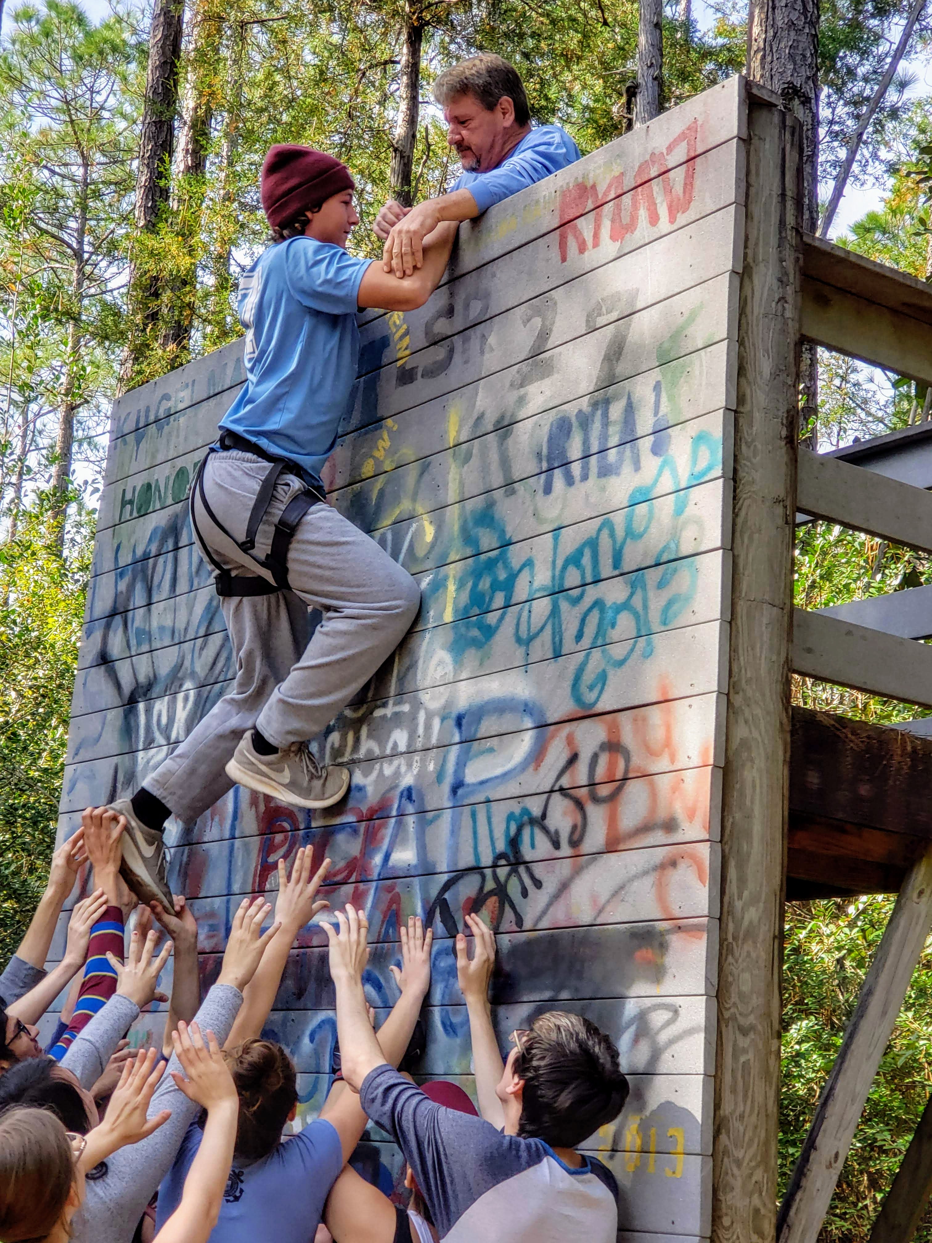 Students completing challenge at Honors Retreat 2018