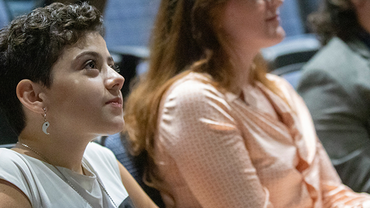 Person looking up in a lecture hall