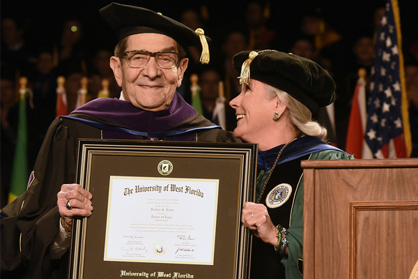 President Martha Saunders at Commencement with Mr. Levin