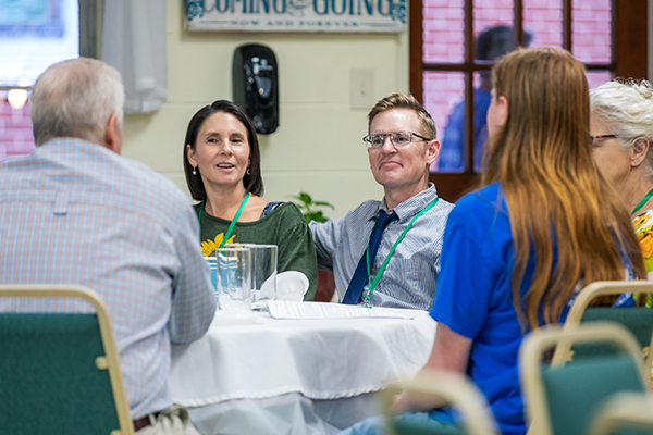 People talking to each other across a table