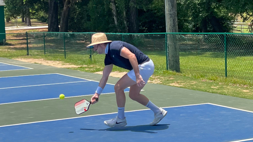 Student playing pickleball