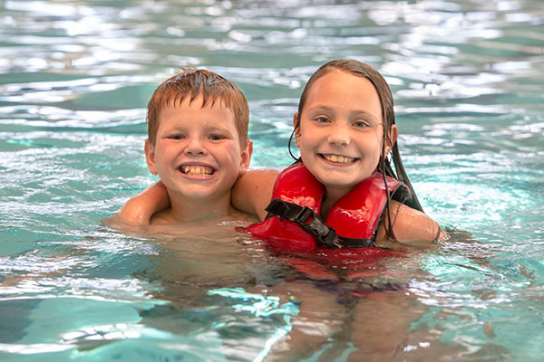 Community members swimming in Aquatic Center