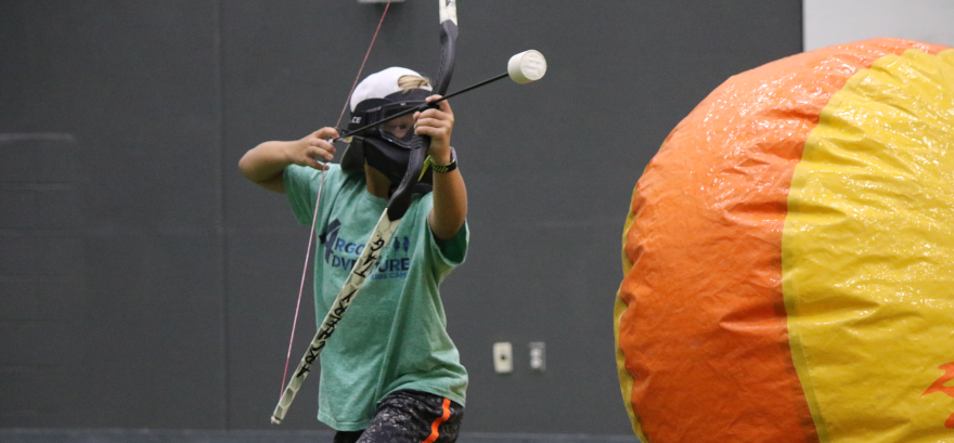 Participant playing archery tag