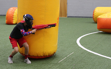 Participant playing indoor paintball