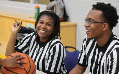 Two officials at an intramural sports event.