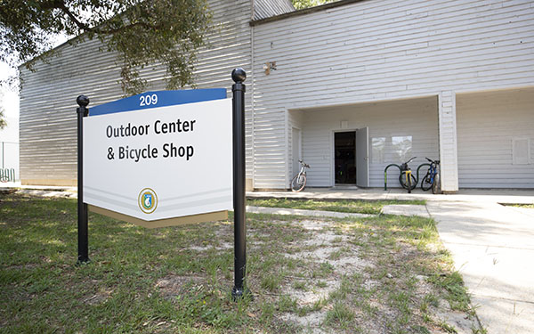 Exterior image of the OA Outdoor Center with a sign that reads 