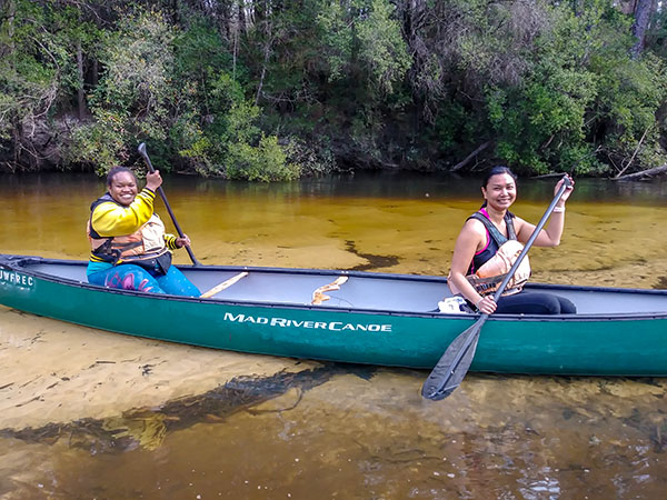 Two students in a canoe