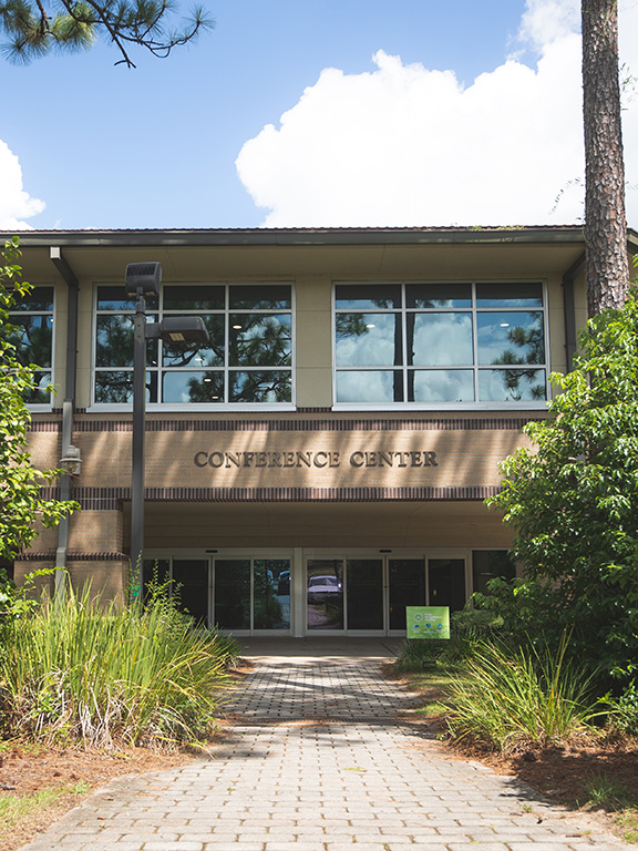 Exterior view of the entrance to the Conference Center on the UWF Pensacola campus.