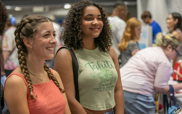 photo of two students attending open house