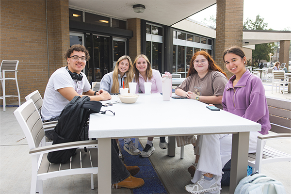 Students eating lunch on Patio West