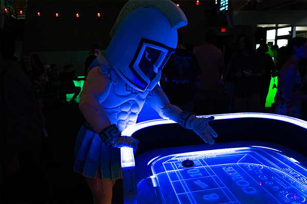 Argie playing a glow in the dark game