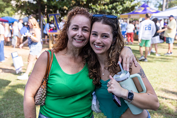 Students and parents enjoying tailgate festivities
