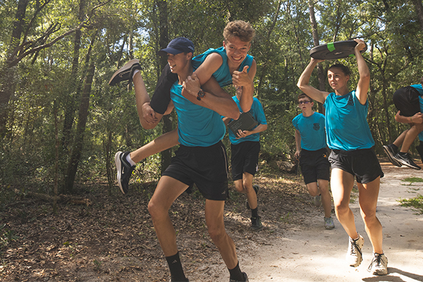 students running on trail facing a challenges