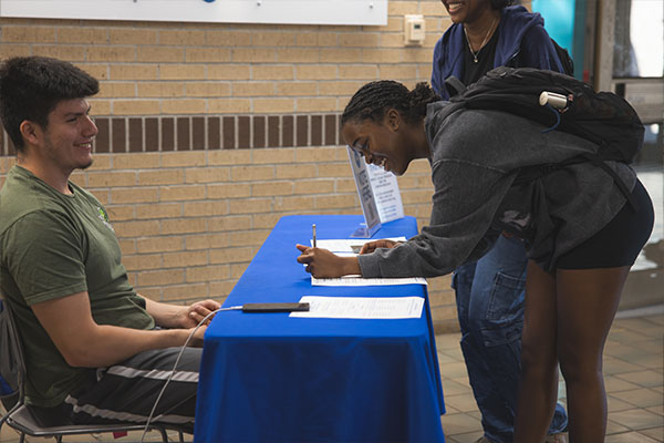 Students voting in the Commons