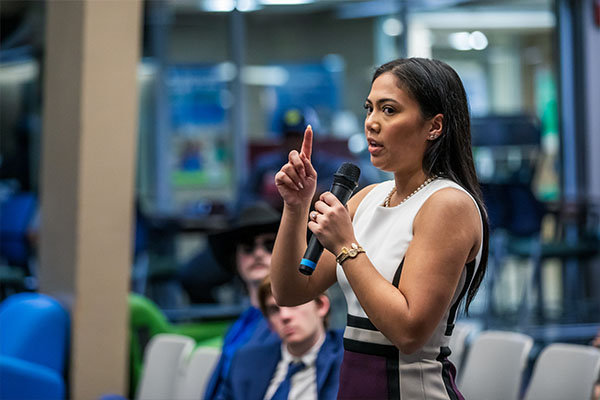 student speaking during an open forum
