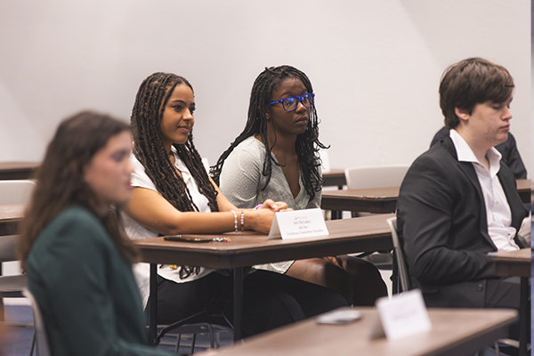 Students sitting at an SGA Meeting
