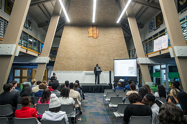 students speaking at open forum